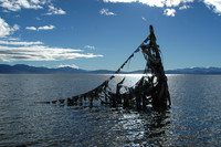 A prayer flag on a Tibetan lake