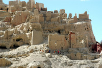 People walking on the ruins of Guge Kingdom