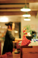 A Dancing Doll on a Bar