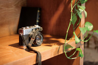 An Old Camera on a Shelf