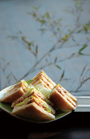 Four Sandwiches at a Bamboo Background