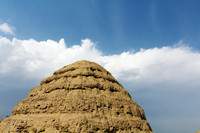 A Mound under Blue Sky and White Cloud